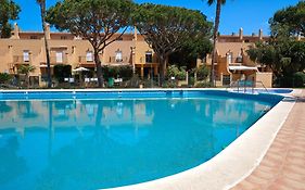 Adosado con jardín y piscina en Chiclana Barrosa-Sancti Petri